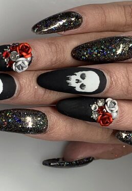Picture of black nails with skulls and roses