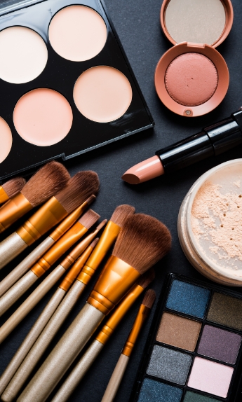 Picture of various makeup supplies and brushes